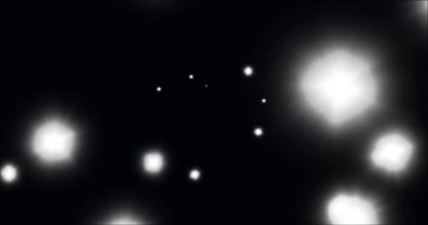 Animatie Van Gloeiende Witte Lichtvlekken Die Hypnotiserende Beweging Zwarte Achtergrond — Stockvideo