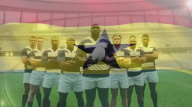 Çok ırklı ragbi takımının üzerinde sallanan Ganalı bayrağın animasyonu kollarını dijital ortamda çaprazlıyor.