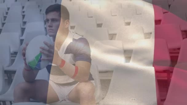 Animación Bandera Francesa Ondeando Sobre Jugador Rugby Masculino Caucásico Sentado — Vídeo de stock