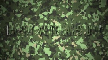 Ordu kamuflajının üzerine beyaz harflerle 