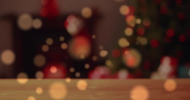 Kırmızı Turuncu Şekillerin Bir Noel Ağacının Üzerinde Süzülmesi Peri Işıklarının — Stok video