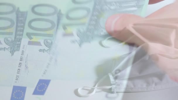 Animacja Osoby Leżącej Eurobanknoty Maskach Twarzy Leżącej Stole Coronavirus Covid — Wideo stockowe