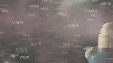 Gri arka planda fıskiyeler kullanarak Covid-19 kelimelerinin animasyonu. Coronavirus Covid-19 pandemik konsept dijital bileşik