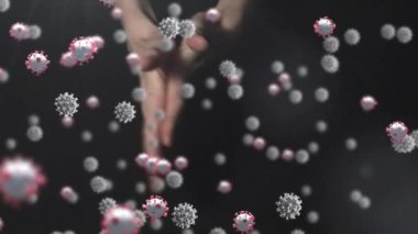 Siyah arka planda yüzen makro Covid-19 hücrelerinin animasyonu. Coronavirus Covid-19 pandemik konsept dijital bileşik