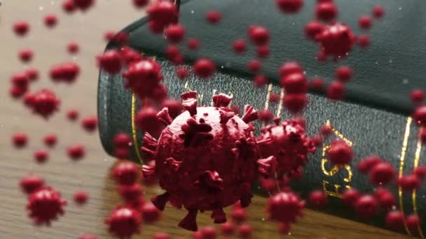 聖書のテーブルの上に横たわる 落下するロザリオの上に浮かんでいるマクロCovid 19細胞のアニメーション コロナウイルスCovid 19パンデミックコンセプトデジタル複合体 — ストック動画