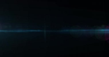 Siyah arkaplanda kusursuz bir döngü içinde hipnotik hareketle hareket eden parlak mor ve yeşil ışık noktalarının canlandırması. 