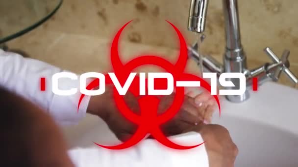 Animation Eines Roten Biologischen Gefahrensymbols Mit Dem Weißen Wort Covid — Stockvideo