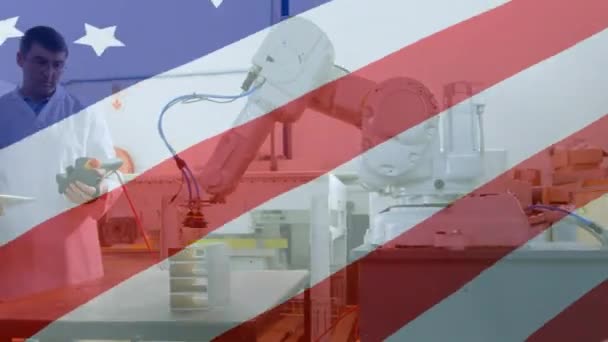 Animación Bandera Americana Ondeando Sobre Dos Hombres Que Trabajan Usando — Vídeo de stock