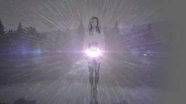 Yoga yapan, doğada meditasyon yapan, ön planda parlayan beyaz ışıkla hareket eden bir kadının animasyonu.