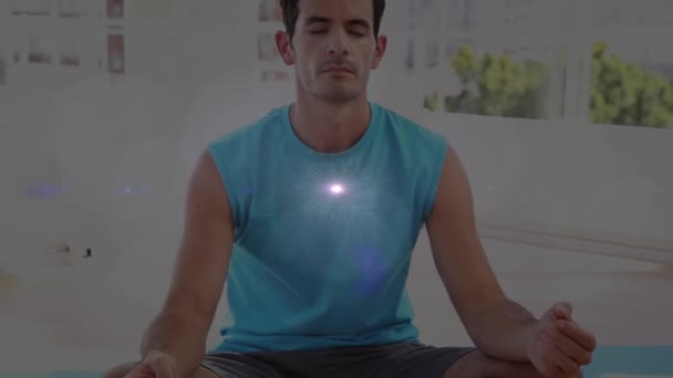Animation Caucasian Man Practicing Yoga Meditating Glowing White Light Flickering — Stock Video