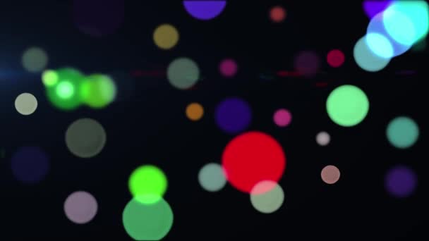 黒を基調としたシームレスなループで左右に動く複数のカラフルな光のスポットのアニメーション — ストック動画