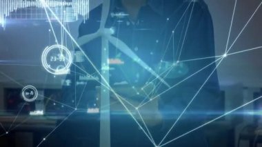 Rüzgar türbini modeli üzerinde çalışan bir mühendis üzerinde üç boyutlu beyaz bağlantı ağının animasyonu.