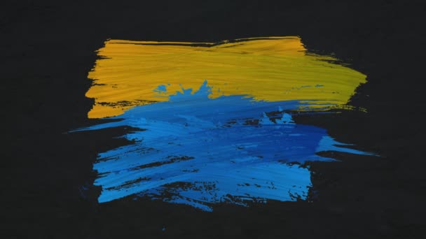 배경에 나타나는 노란색과 파란색 페인트의 애니메이션 — 비디오