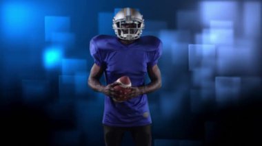 Mavi zemin üzerinde hareket eden çoklu kareye karşı elinde rugby topu tutan erkek ragbi oyuncusunun dijital kompozit videosu