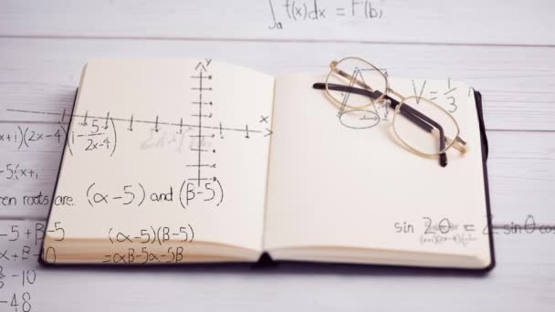 Vídeo Compuesto Digital Ecuaciones Matemáticas Diagramas Moviéndose Sobre Cuaderno Abierto — Vídeos de Stock