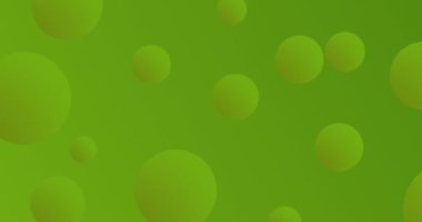 Yeşil arka planda kusursuz döngü içinde hipnotik hareketlerle hareket eden birden fazla yeşil topların ve beyaz noktaların animasyonu. Renk ışığı ve hareket kavramı dijital olarak oluşturuldu.