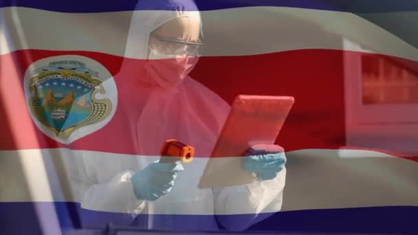 Animation Costa Rican Flag Waving Caucasian Male Scientist Using Digital — Stock Video