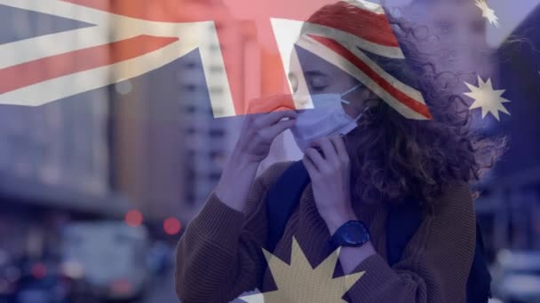 Avustralya Bayrağının Yüz Maskesi Takan Beyaz Bir Kadının Üzerinde Dalgalandığı — Stok video