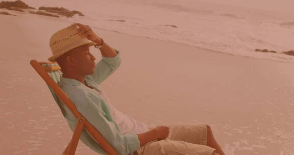 African American Man Sitting Chair Relaxing Beach Travel Vacation Leisure — Stock Photo, Image