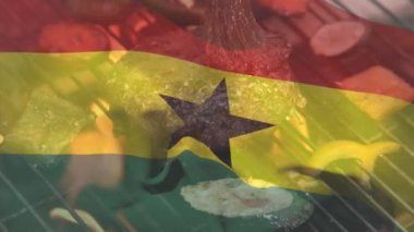 Et ve barbekü üzerine Ghana bayrağı animasyonu. Vatanseverlik ve kutlama konsepti dijital olarak oluşturulmuş video.