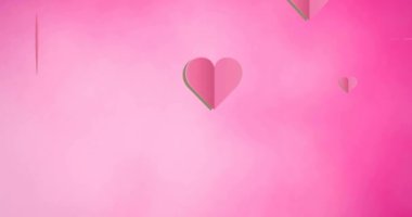 Pembe arka planda düşen pembe kalplerin animasyonu. Desen ve aşk konsepti dijital olarak oluşturulmuş video.
