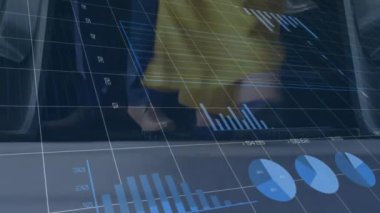 Animation of financial data processing over diverse business people. Global business, finances and digital interface concept digitally generated video.