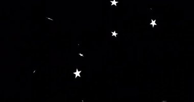 Siyah arka planda yüzen yıldızların animasyonu. Soyutlama, şekiller ve şablon konsepti dijital olarak oluşturuldu.