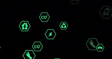 Siyah arkaplanda düşen ekoloji simgelerinin animasyonu. Şekiller ve ekoloji konsepti dijital olarak oluşturulmuş video.
