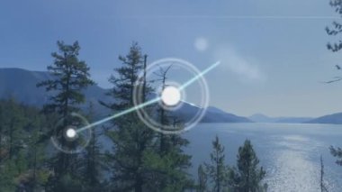 Dağ manzarası üzerindeki simgelerle bağlantı ağının animasyonu. Dijital olarak oluşturulmuş küresel bağlantılar, doğa ve dijital arayüz kavramı.