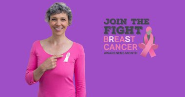 Image of breast cancer awareness text over smiling caucasian woman on purple background. breast cancer positive awareness campaign concept digitally generated image. clipart