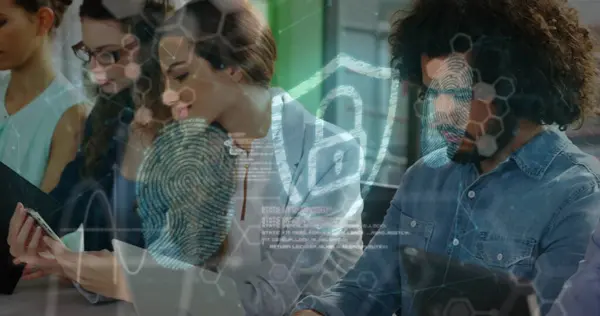 Image of digital shield with padlock over happy diverse female and male coworkers. Business, data processing, digital security, connections and technology concept digitally generated image,