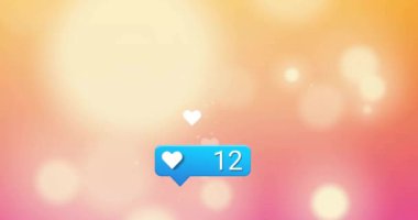 Sosyal medya ikonunun, kalpler üzerinde artan sayıda ve turuncu arka planda ışık noktaları olan animasyonu. Küresel sosyal medya ve dijital arayüz kavramı dijital olarak oluşturulmuş video.