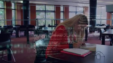 Animation of computer programming language over caucasian woman writing in book in library. Digital composite, multiple exposure, studying, coding, education, university and technology concept.