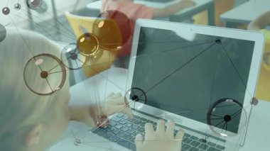 Girl typing on silver laptop and initiating pulsating network overlay around screen in education. Technology, innovation, education, digital, collaboration, communication, modern