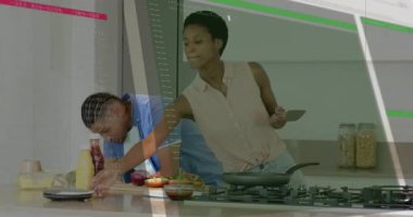 Hamburger pişirmek için domates dilimleme ve ısıtma tavası bir araya getirmek kılavuz akışı sağlar. Aşçılık, takım çalışması, modern, enerjik, gurme, yaşam tarzı, motivasyon