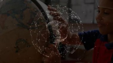 Dijital ağ, dünyanın tepesindeki çocuğun eğitim için dünyayı döndürmesi ve dönüşümlü olarak izlemesi. Etkileşimli, eğitici, fütüristik, yenilikçi, yenilikçi, genç, keşif, teknoloji