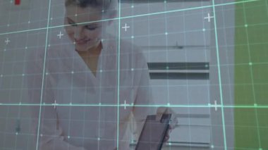 Educator adjusting tablet angle in classroom, guiding student tapping tablet with animated graphics. Technology, education, e-learning, digital, classroom, interaction, innovation