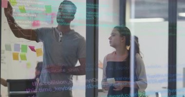 Picking up marker developer sketching glass in tech meeting manager organizing notes pointing code. Collaboration, brainstorming, innovation, digital, modern, teamwork, whiteboard