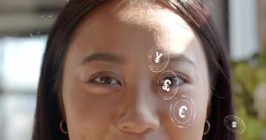 Sunlight initiating currency symbols appearing, fading on sitting woman face, visualizing finance. Finance, digital, modern, technology, business, innovation, financial