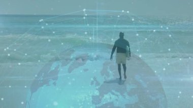 Sahildeki yaşlı Afro-Amerikan adam yerine Dünya 'nın animasyonu. Doğa, uyum ve dijital arayüz kavramı dijital olarak oluşturulmuş video.
