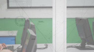 Multiple student hands appearing on keyboards initiating group coding in school computer lab. Collaboration, education, technology, teamwork, innovation, classroom, learning