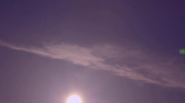 Animation of light trails over sky with clouds. Global technology, computing and digital interface concept digitally generated video.