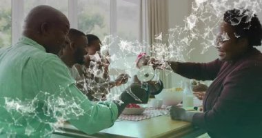 Teknoloji ağı grafik kayması ailenin kahve fincanlarını paylaşma ritüelini ortaya çıkardı. Dijital, bağlantı, sıcaklık, gelenek, konfor, birliktelik, ailevi