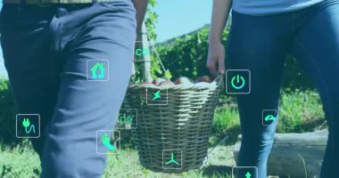 Multiple round scanners against mid section of two businessmen shaking hands against senior spinning circles. Health precautions during covid pandemic concept digitally generated video.