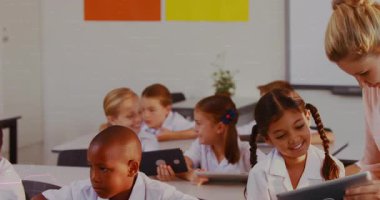 Animation of mathematical equations over schoolchildren using laptop. Back to school and education concept.