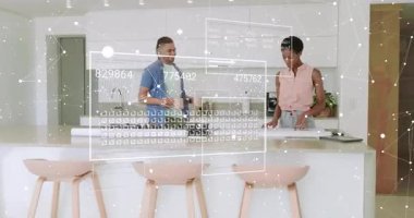 Man entering kitchen with mug and starting document review with drifting data overlays for business. Collaboration, domestic, modern, technology, communication, productivity, teamwork