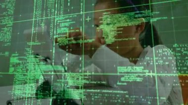 Student tapping tablet screen and generating green code overlay while mastering coding lesson. Technology, education, innovation, focus, concentration, digital, learning