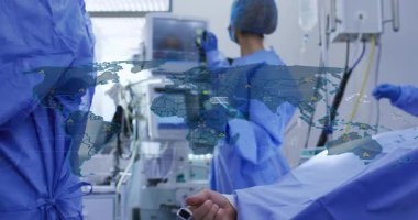 doctor adjusting monitor and initiating global health map while nurses assembling anesthesia mask. Medical, healthcare, surgery, technology, teamwork, clinical, innovation