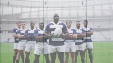 Rugby kaptanı takım arkadaşlarıyla poz veriyor. Şebeke hatları yanıp sönüyor. Spor reklamı için topu gösteriyor. Sporcular, takım çalışması, rekabetçi, sportif, stadyum, zafer, güç