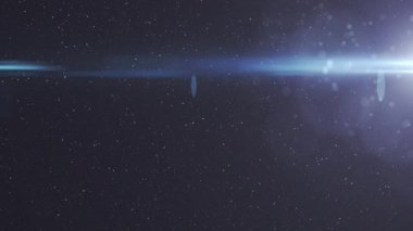 Siyah arkaplanda ışık noktalarının üzerinde hareket eden ışık izlerinin animasyonu. ışık, desen ve hareket konsepti dijital olarak oluşturulmuş video.